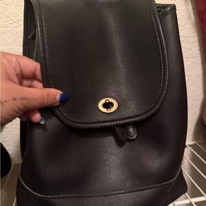 Coach Black Leather Backpack with Gold Accent